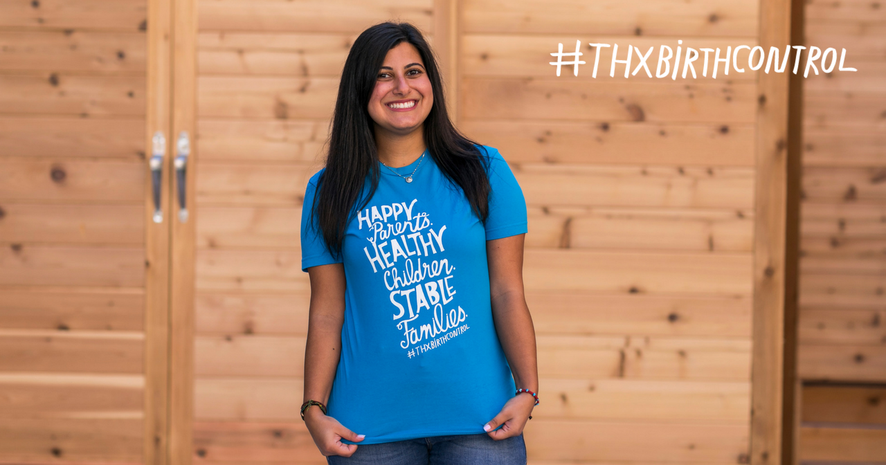 A woman wearing a thanks, birth control shirt