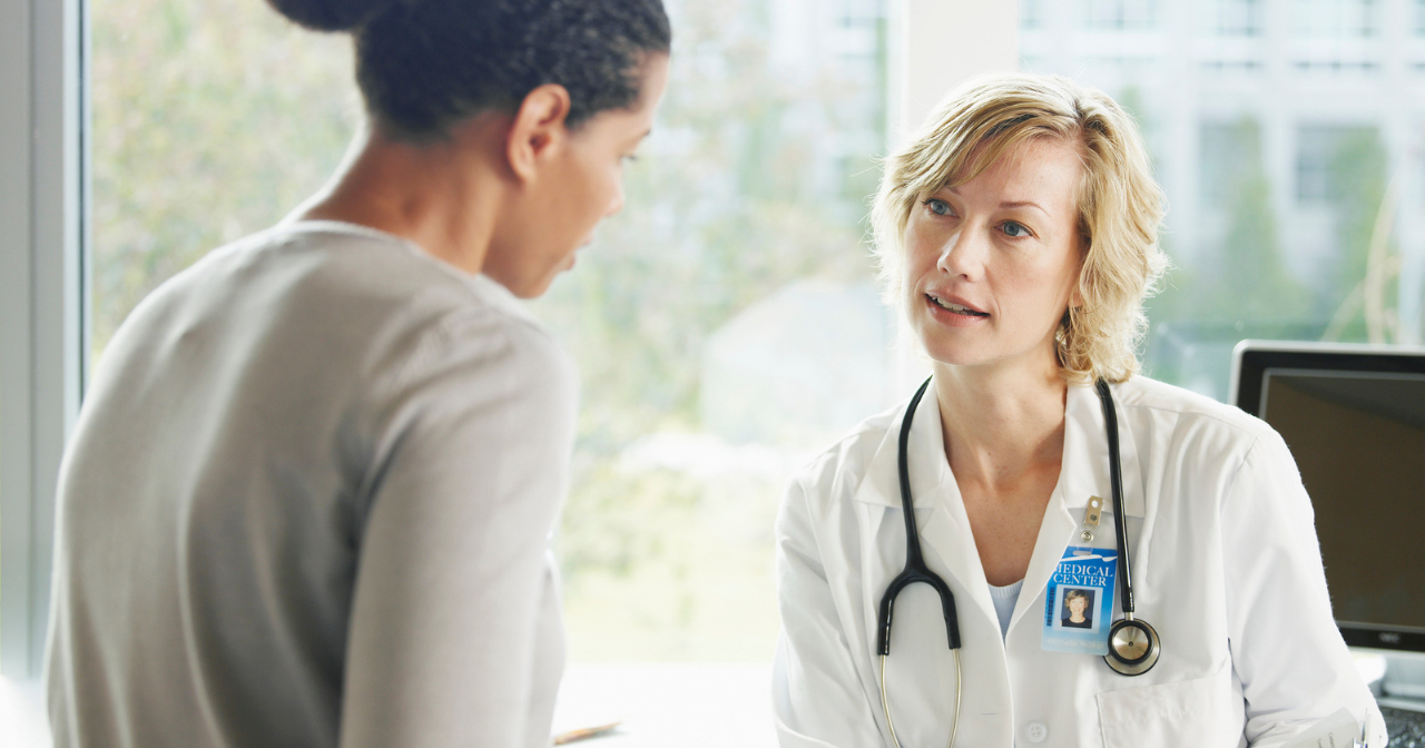 A woman and her provider talk