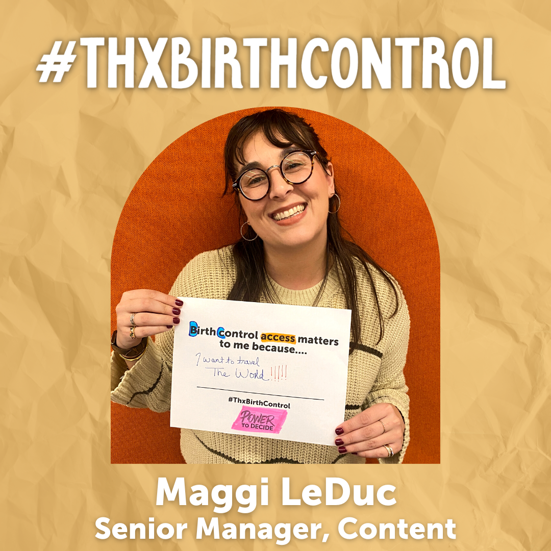 A Power to Decide Staffer holds a sign with their reason for saying #ThxBirthControl.