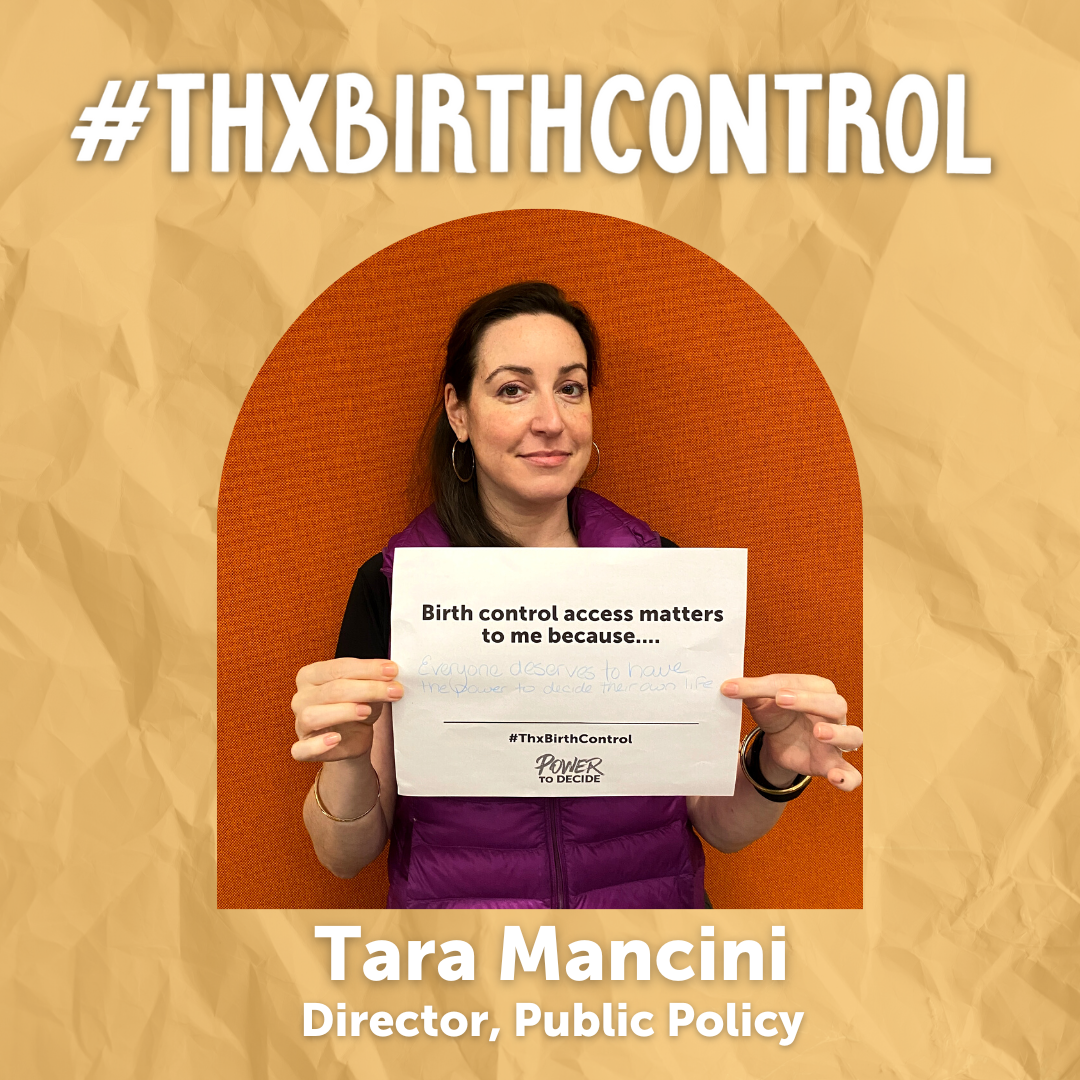 A Power to Decide Staffer holds a sign with their reason for saying #ThxBirthControl.