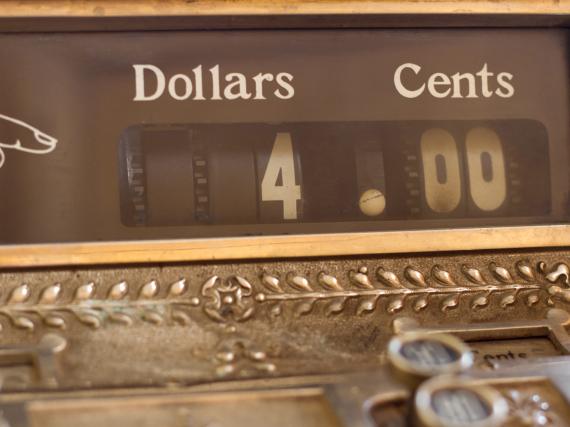 An image of a cash register showing $4.00